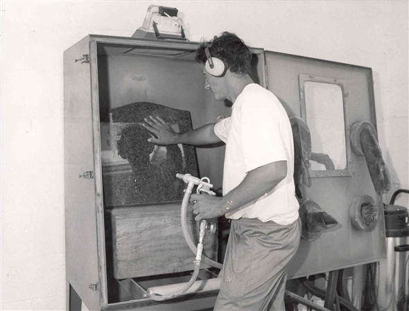 Photo:Glen Thane headstone engraving with the latest sandblasting equipment, 1991