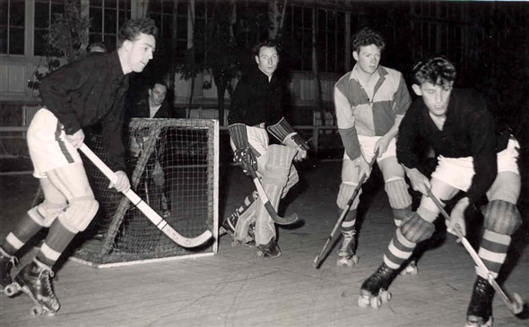 Photo:Members of the Comets Roller Hockey team playing a game in the Winter Gardens, 1957