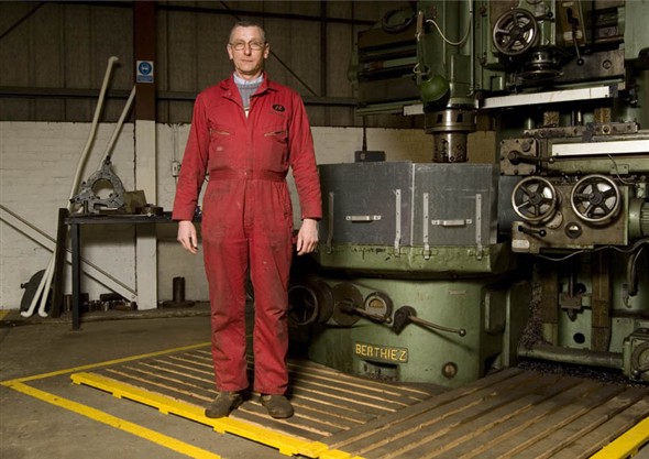 Photo:Portrait of David Newcombe in the machine shop