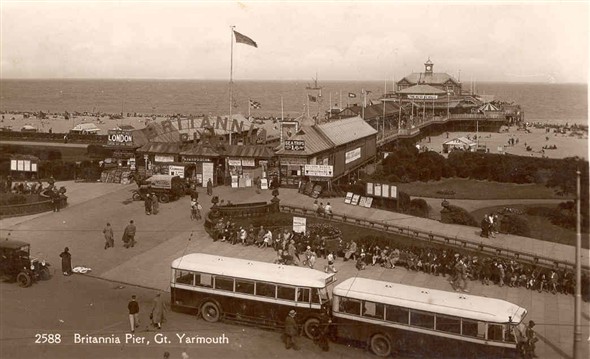 Photo:Postcard showing Britannia Pier with day-trip coaches