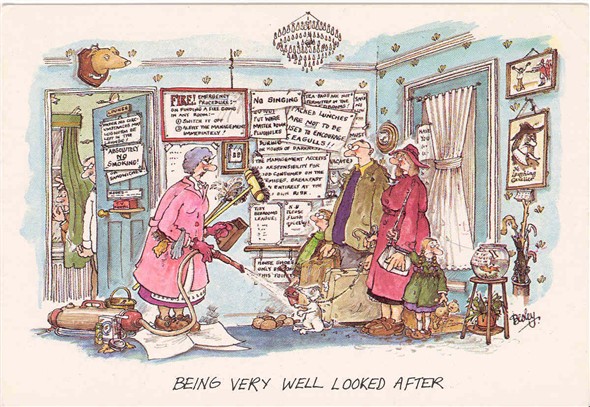Photo:Seaside humour postcard reading 'Being very well looked after'